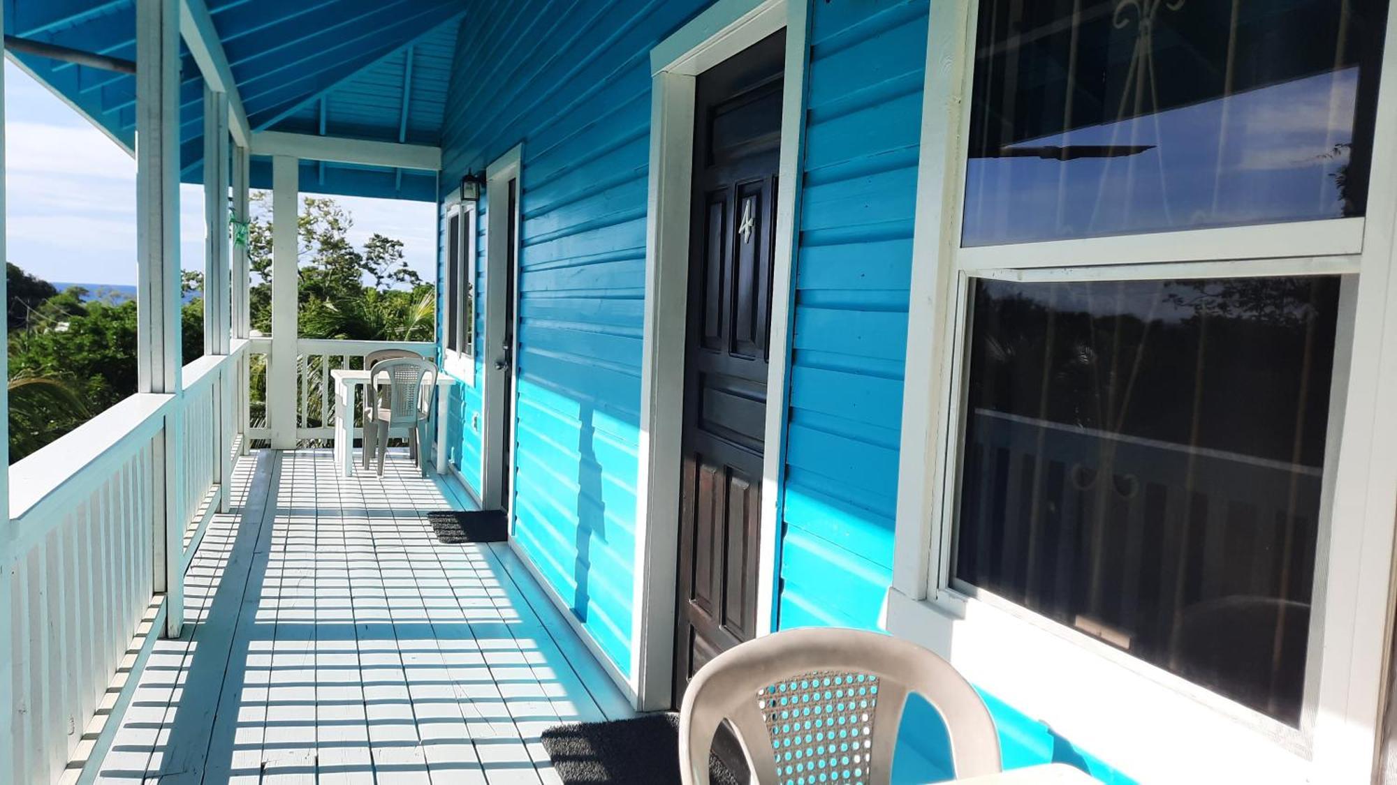 Guava Grove Resort & Villas Sandy Bay Oda fotoğraf